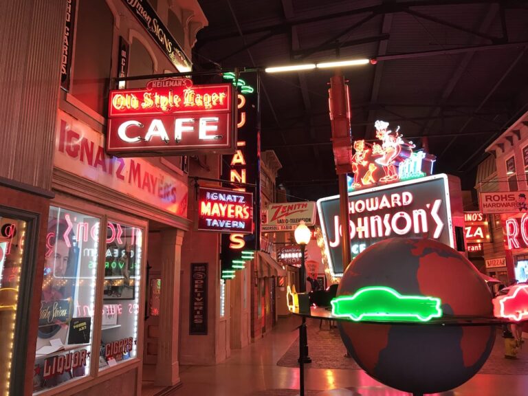 A variety of neon signs inside the American Sign Museum advertising stores and restaurants.