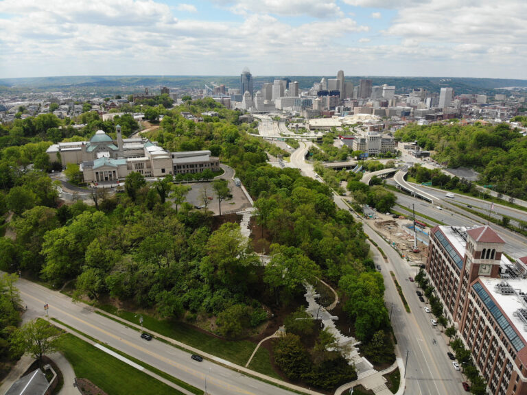 Aerial view of Cincinnati skyline focusing on Cincinnati Museum of Art’s Art Climb structure.